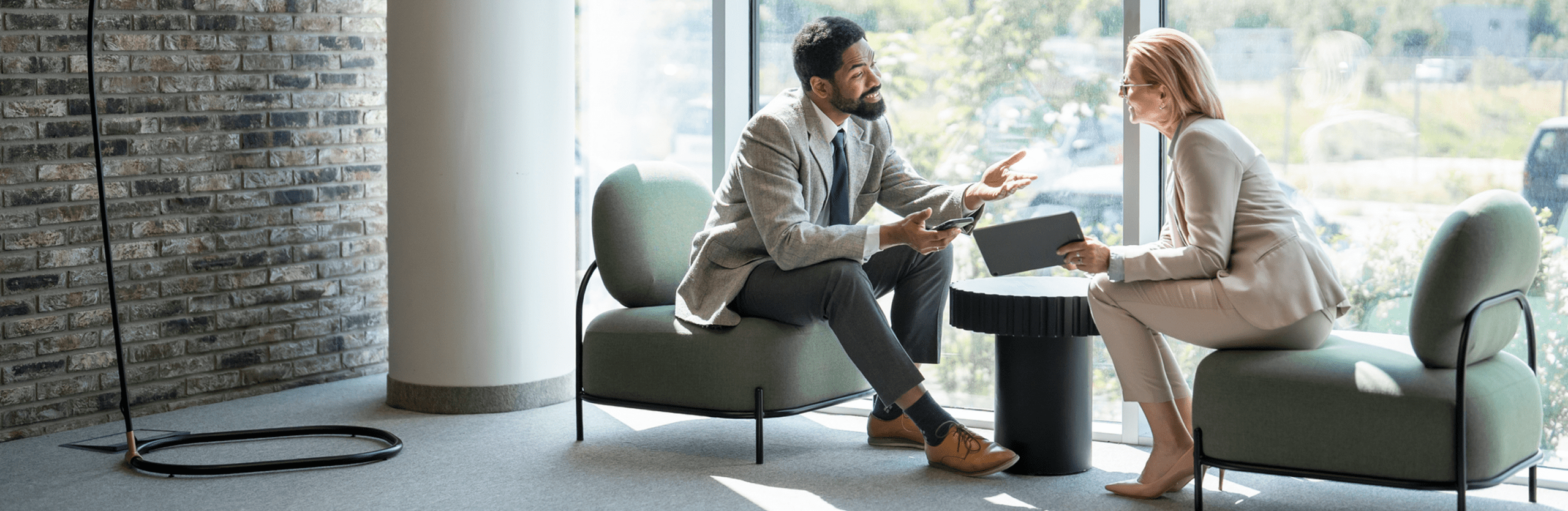 Professional conversation in sleek office setting