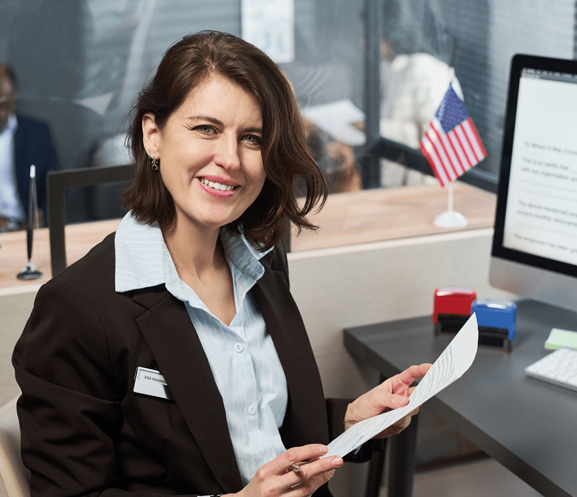 Professional woman reviewing paperwork at office