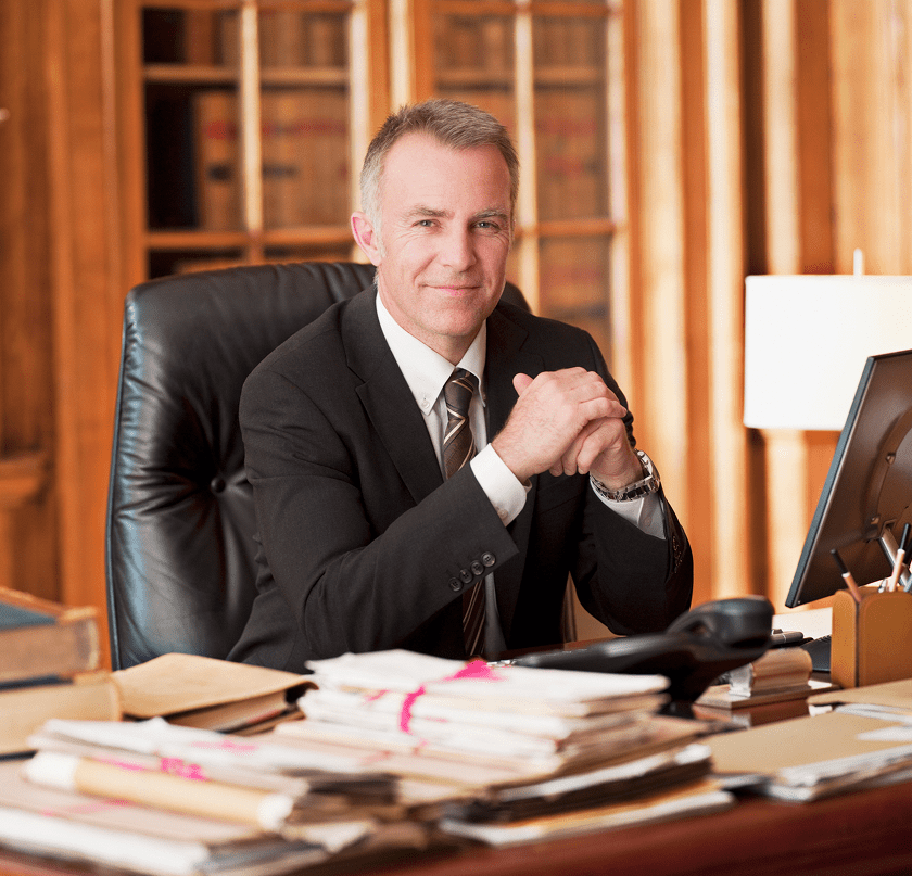 Man in suit with paperwork